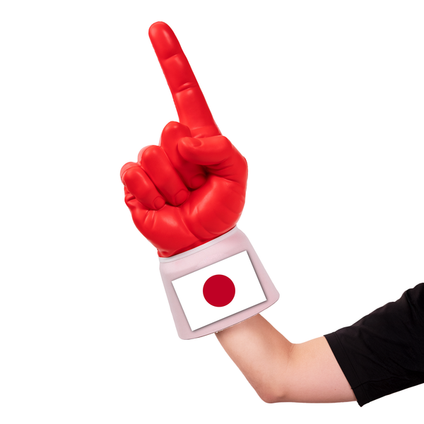 Fan wearing Japan RadHand Foam Finger for international soccer match day